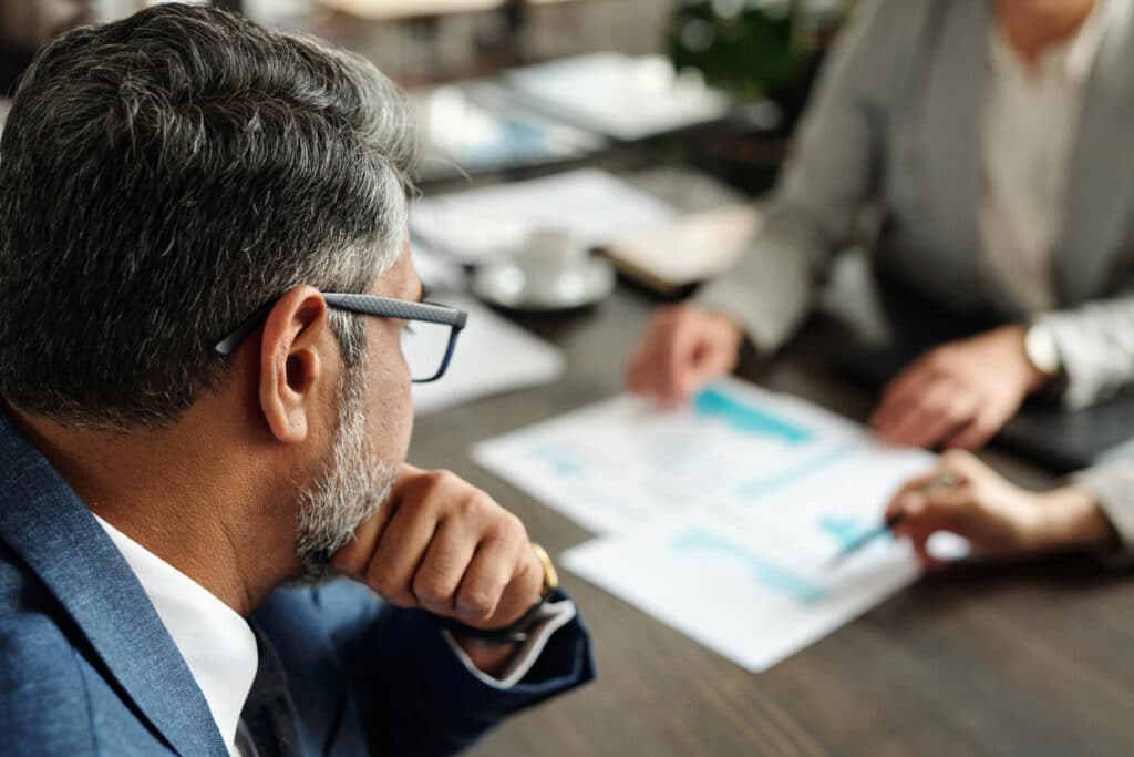 Employer and worker discussing a Labour Market Impact Assessment