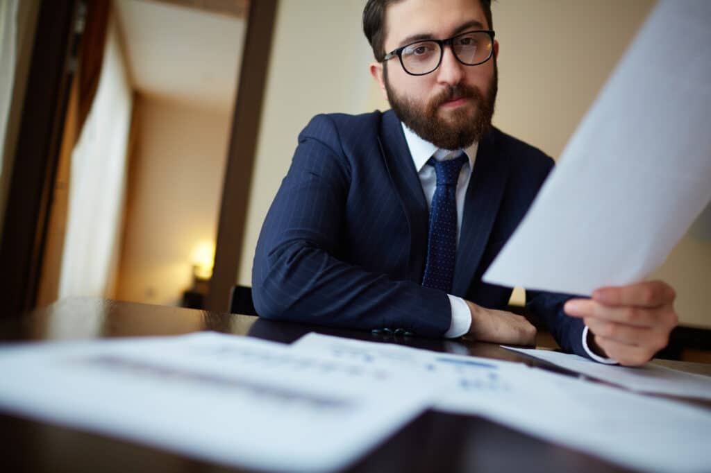 Professional reading a procedural fairness letter