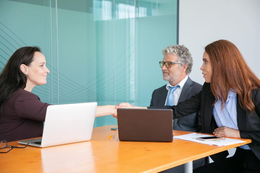 Lawyer and client concluding a deportation defence consultation